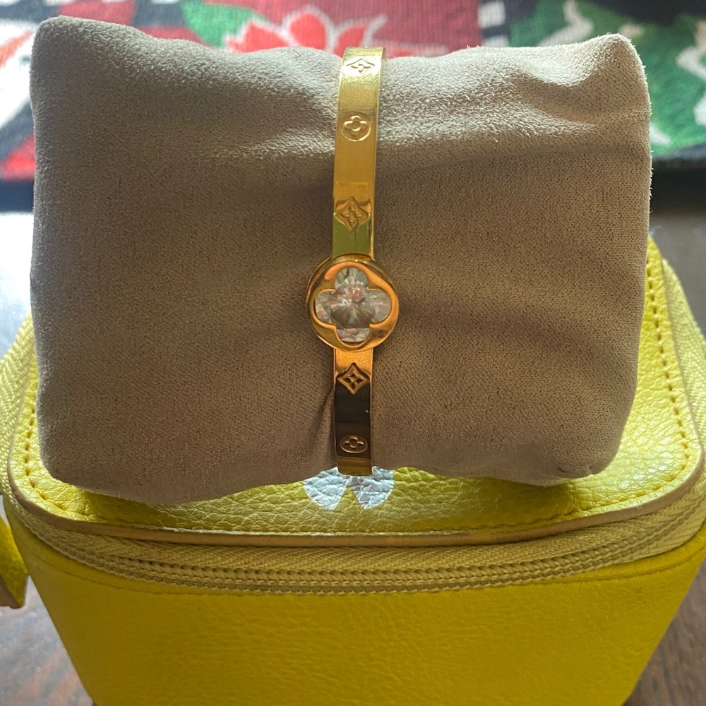 Gold Bracelet with Floral Accent